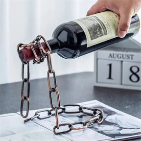 Porta Vinho de Mesa Corrente Flutuante Mágica Bigstock